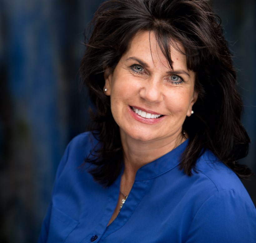 patient of Excellence in Dentistry showing on the benefits of cosmetic dentistry