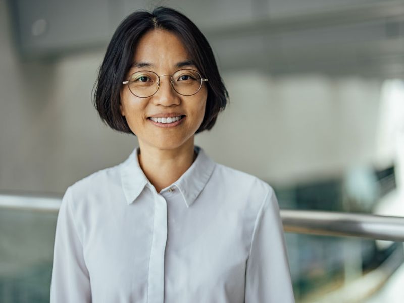 woman-in-glasses-smiling-with-teeth